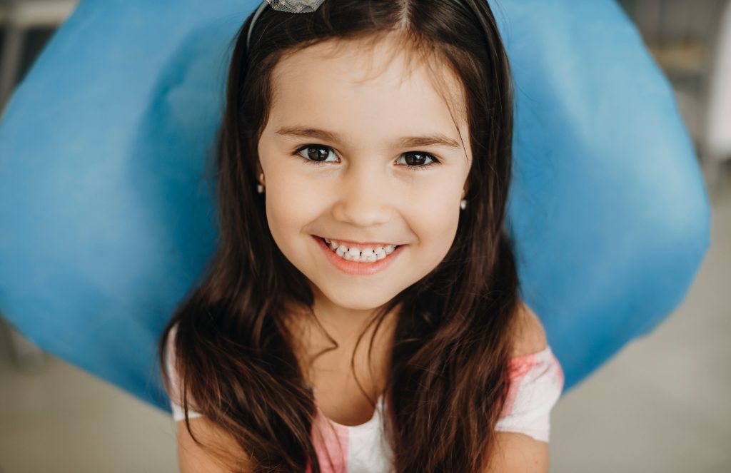 Smiling girl with long brown hair